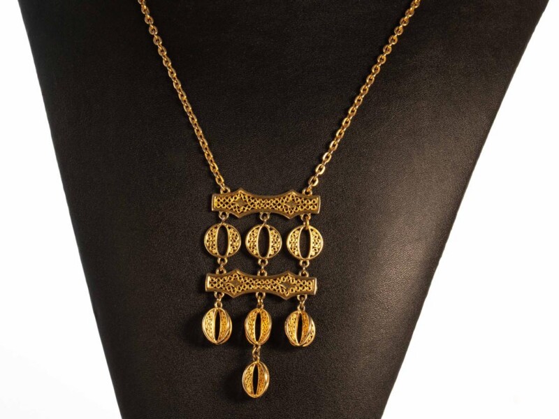 Collana vintage in metallo dorato