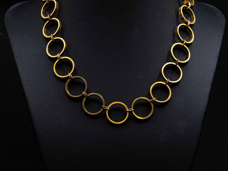 Collana vintage in metallo dorato ad anelli