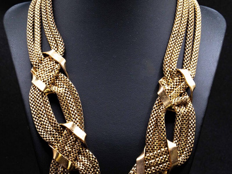 Collana vintage in metallo dorato a maglia intrecciata