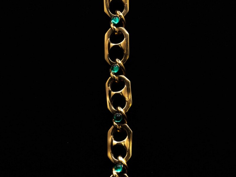 Bracciale vintage dorato maglia semi rigida e strass in vetro verde