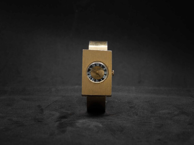 Bracciale vintage rigido dorato con orologio Hattie Carnegie