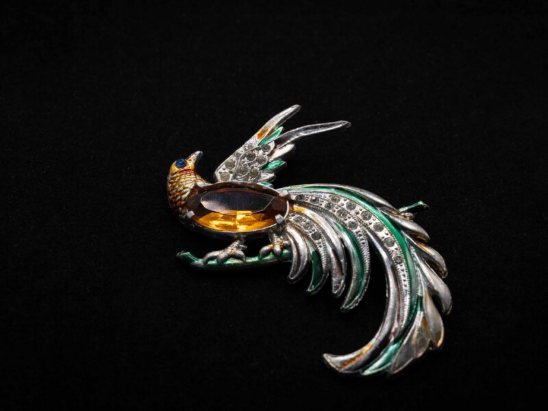 Spilla vintage uccello del paradiso con strass color ambra