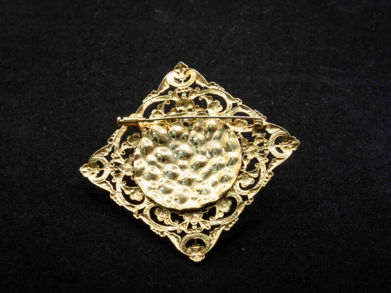 Spilla vintage con centrale in strass color ambra
